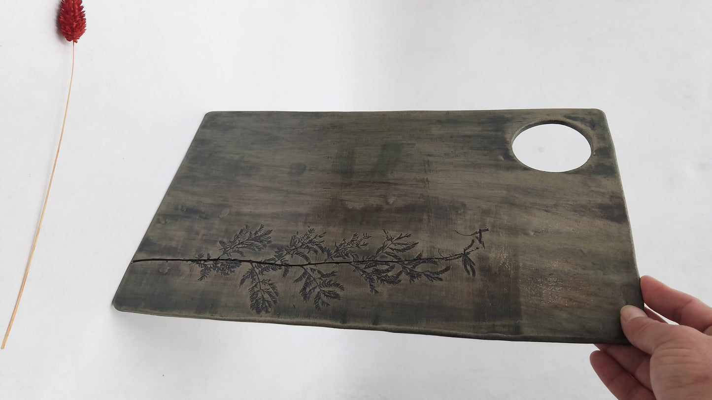 קרש חיתוך בהטבעת צמח הינבוט